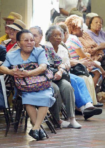 
Voters wait Monday to cast their ballot at the Miami-Dade Government Center. 
 (Associated Press / The Spokesman-Review)