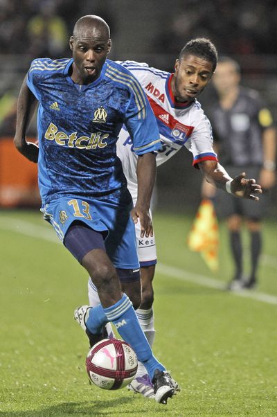 Defender Djimi Traore, left, has quickly fit in with the Sounders. (Associated Press)
