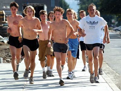 
Richard Keroack, middle, leads the West Valley High boys cross country team on a run. The team is going to 2A status from 3A this season. This will be the team's first year in the Great Northern League.
 (Liz Kishimoto / The Spokesman-Review)