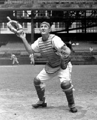 
Cleveland Indians Hall of fame catcher Al Lopez, takes off his catcher's mask for a pop foul ball in this posed action photo in 1946.
 (File/Associated Press / The Spokesman-Review)