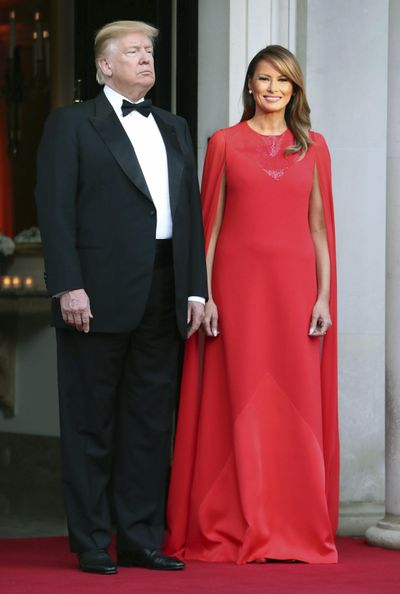 U.S. President Donald Trump and first lady Melania Trump wait to greet Britain’s Prince Charles and Camilla, the Duchess of Cornwall, outside Winfield House, the residence of the Ambassador of the United States of America to the U.K., in Regent’s Park, prior to the Return Dinner as part of his state visit to the U.K., in London, Tuesday June 4, 2019. (Chris Jackson / Associated Press)