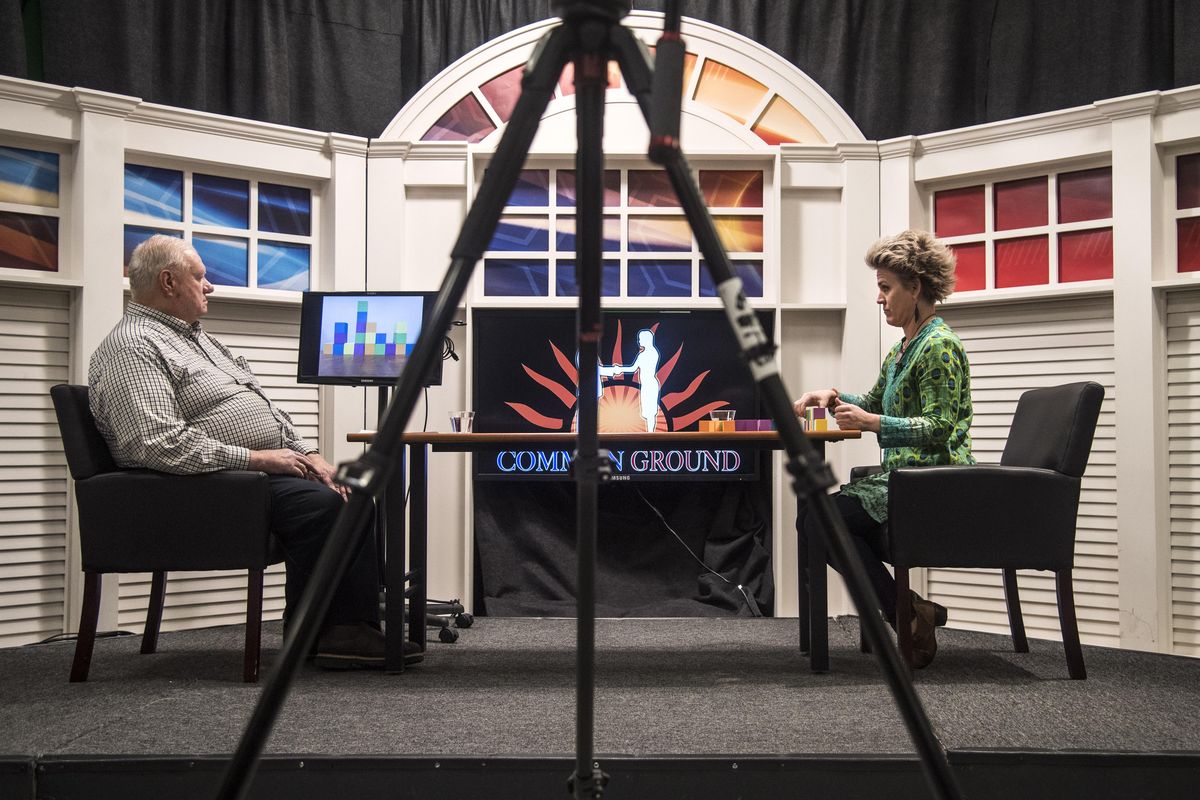 Mike Fitzsimmons and Amber McKenzie combine efforts during a block-building exercise as part of the “Common Ground” taping for GU-TV, Saturday, Oct. 14, 2017, on the Gonzaga campus. (Dan Pelle / The Spokesman-Review)