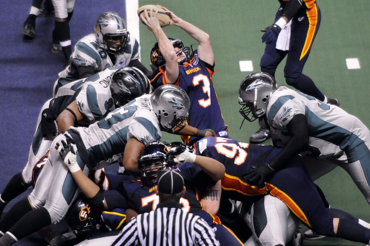 The Spokane Shock's quarterback Kyle Rowley (3) sneaks in for a touchdown late in the first half against Bossier-Shreveport on Saturday, April 17, 2010, in the Spokane Arena. (Dan Pelle / The Spokesman-Review)