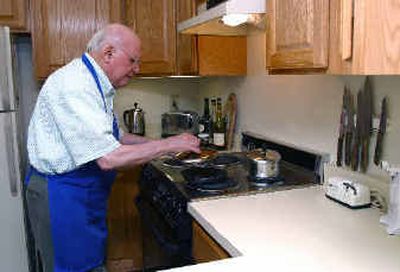 
 Frank Binette, 86, cooks a meal at his home in Laconia, N.H., on May 7. Binette feels more at home in his kitchen after completing a cooking course for men at a hospital.  Frank Binette, 86, cooks a meal at his home in Laconia, N.H., on May 7. Binette feels more at home in his kitchen after completing a cooking course for men at a hospital. 
 (Associated PressAssociated Press / The Spokesman-Review)