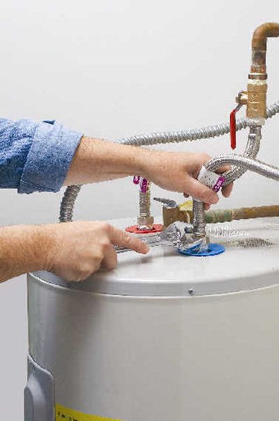 
Routine maintenance on your furnace and other key units like your water heater (above) will help ensure you're not left in the cold this winter.
 (MultiAd / The Spokesman-Review)