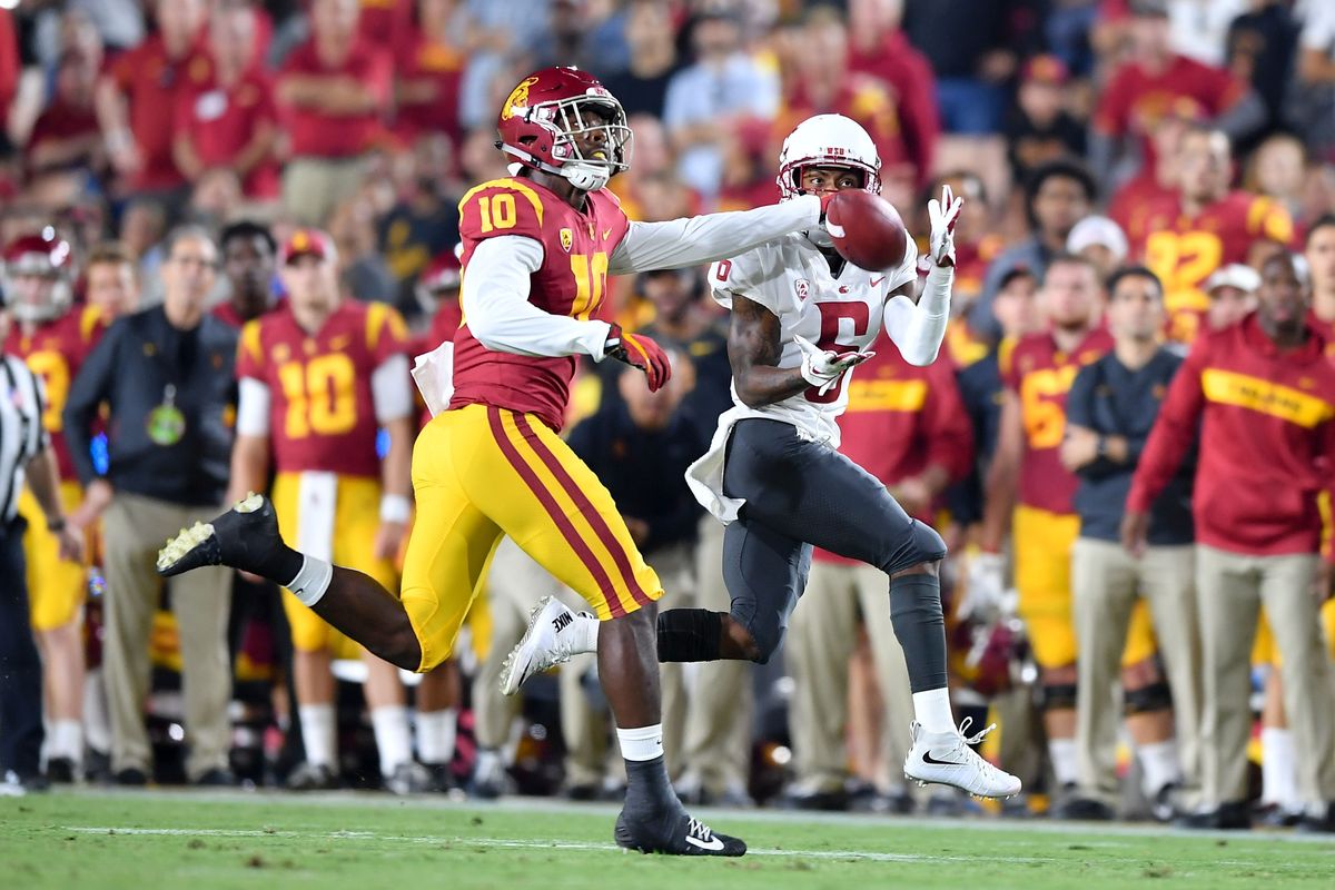 WSU receiver Jamire Calvin hauls in a pass against USC during a 2018 game at the Memorial Coliseum in Los Angeles, Calif., where the Cougs return in 2020.  (Tyler Tjomsland / The Spokesman-Review)