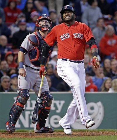 Boston’s David Ortiz grimaces after fouling the ball off his foot against Twins last week. (Associated Press)