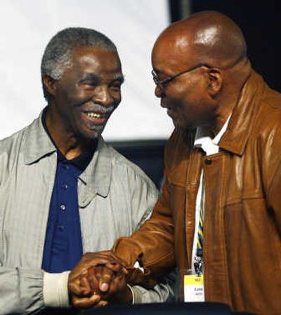 
Jacob Zuma, right, shakes hands with South African President Thabo Mbeki on Tuesday in Polokwane. Associated Press
 (Associated Press / The Spokesman-Review)