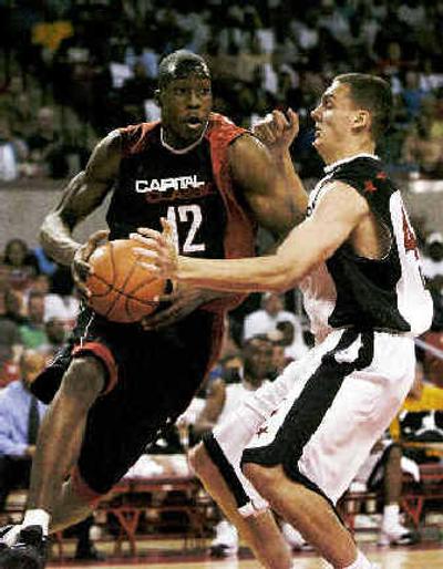 
Dwight Howard, left, could be top pick in draft. 
 (Associated Press / The Spokesman-Review)