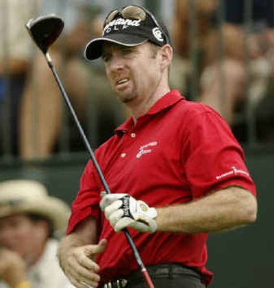 
Rod Pampling watches his ball after teeing off for the third round of The International. He is tied for the lead. 
 (Associated Press / The Spokesman-Review)