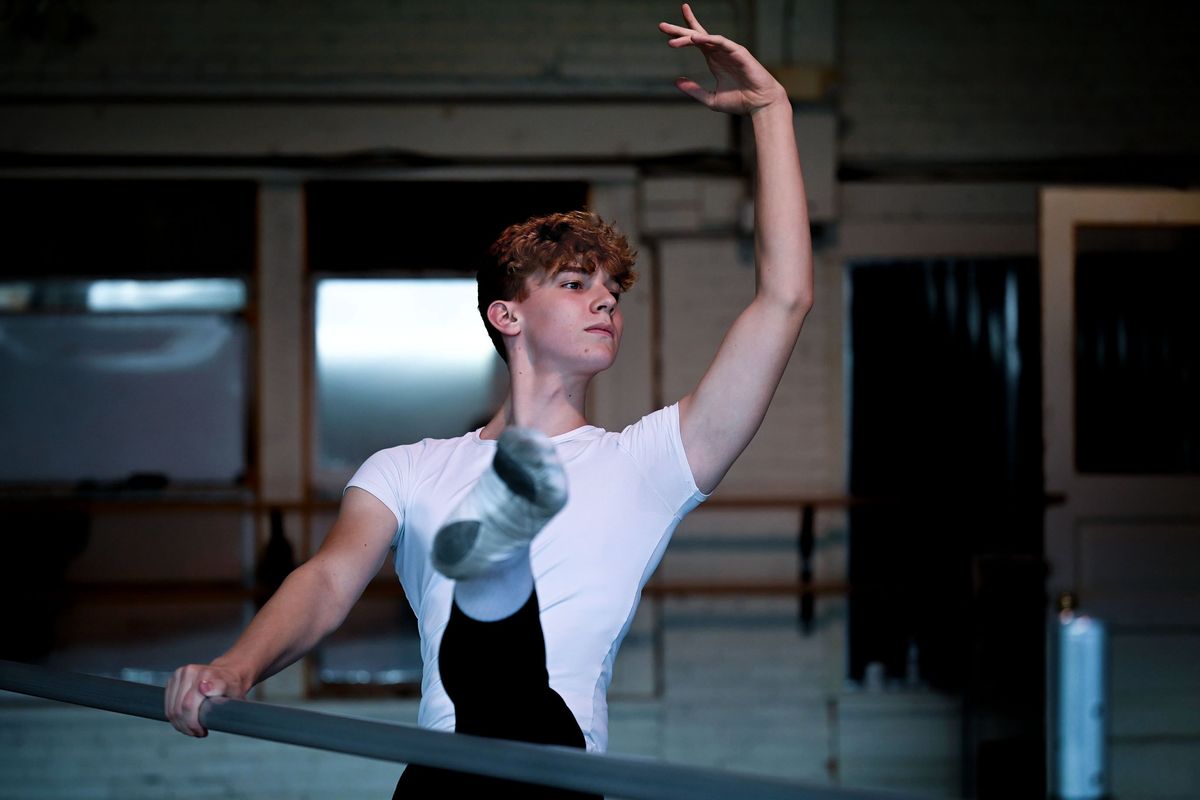 Ballet student Eli Waunch demonstrates a few ballet moves before class at Ballet Arts Academy in Spokane on Wednesday, Sept. 21, 2023.  (Kathy Plonka/The Spokesman-Review)