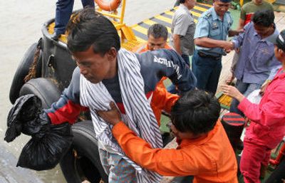 
Some of the 27 survivors of last week's ferry sinking who were rescued Wednesday arrive  in Surabaya, East Java, Indonesia. 
 (Associated Press / The Spokesman-Review)