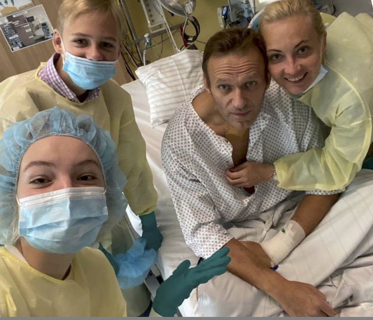 This handout photo published by Russian opposition leader Alexei Navalny on his instagram account, shows himself, centre, and his wife Yulia, right, daughter Daria, and son Zakhar, top left, posing for a photo in a hospital in Berlin, Germany. Russian opposition leader Alexei Navalny has posted the picture of himself in a hospital in Germany and says he