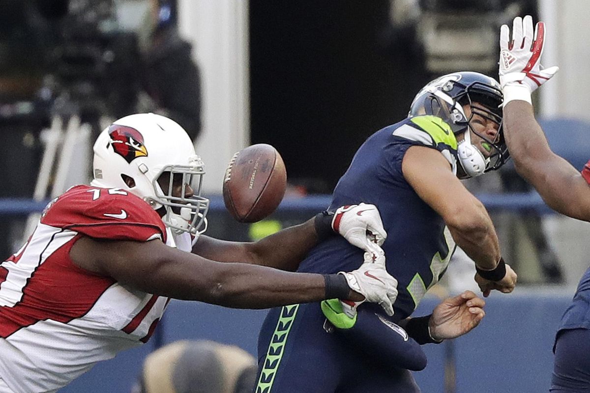 Cardinals, Seahawks settle for historic tie after wild OT