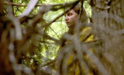 
Coeur d'Alene High School 10th-grader Erin Bills looks for the next tree to mark near Sage Creek drainage, north of Coeur d'Alene, on Tuesday. She is taking the advanced forest management class at Coeur d'Alene High. 
 (Kathy Plonka / The Spokesman-Review)
