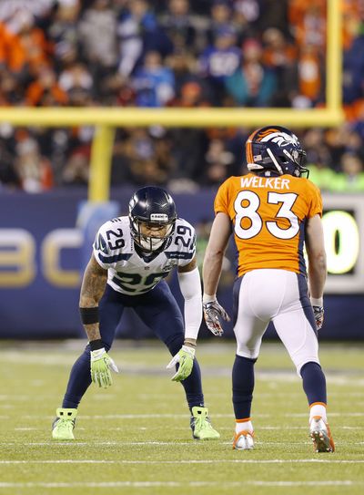 The Seattle Seahawks and safety Earl Thomas, left, know they face a motivated Denver team today. (Associated Press)