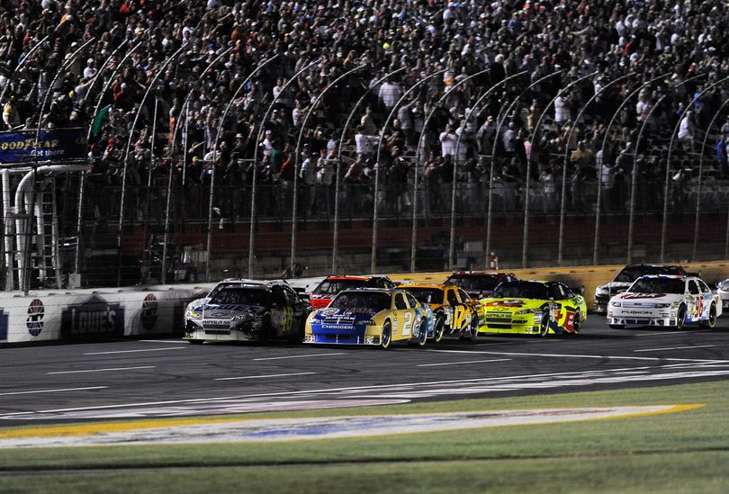 Pole sitter Jimmie Johnson opted to take the outside lane to start the NASCAR Sprint All-Star Race at Lowe's Motor Speedway. The double-file format beings in points competition this weekend at Pocono. (Photo Credit: John Harrelson/Getty Images)  (John Harrelson / The Spokesman-Review)