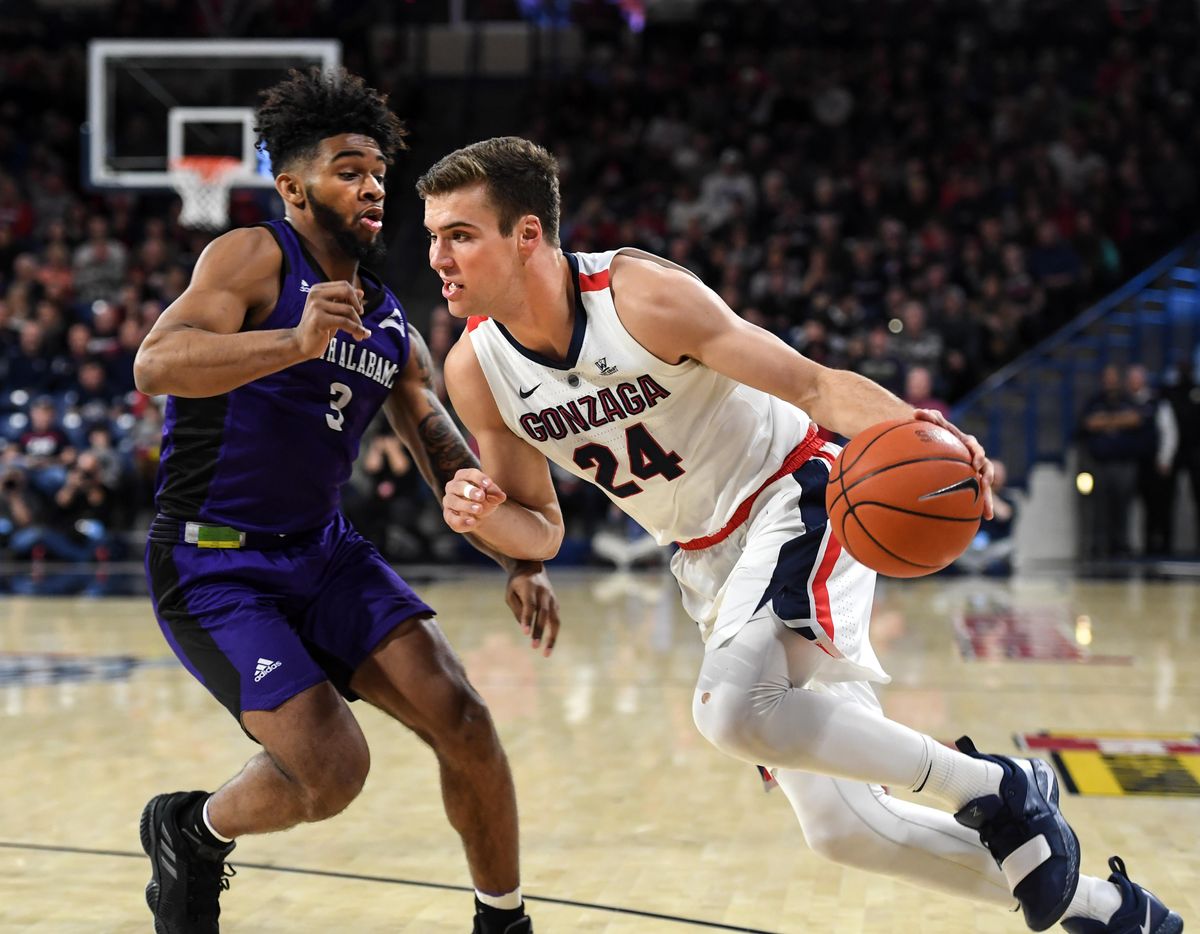 Gonzaga guard Corey Kispert blow past North Alabama guard Jamari Blackmon, Friday, Dec. 28, 2018 in the McCarthey Athletic Center. (Dan Pelle / The Spokesman-Review)