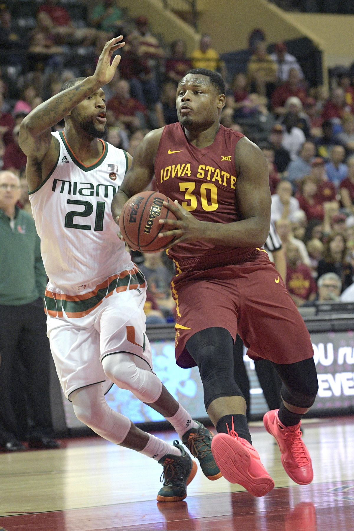 Iowa State guard Deonte Burton (30) was the Big 12 newcomer of the year last season after transferring from Marquette. (Phelan M. Ebenhack / Associated Press)