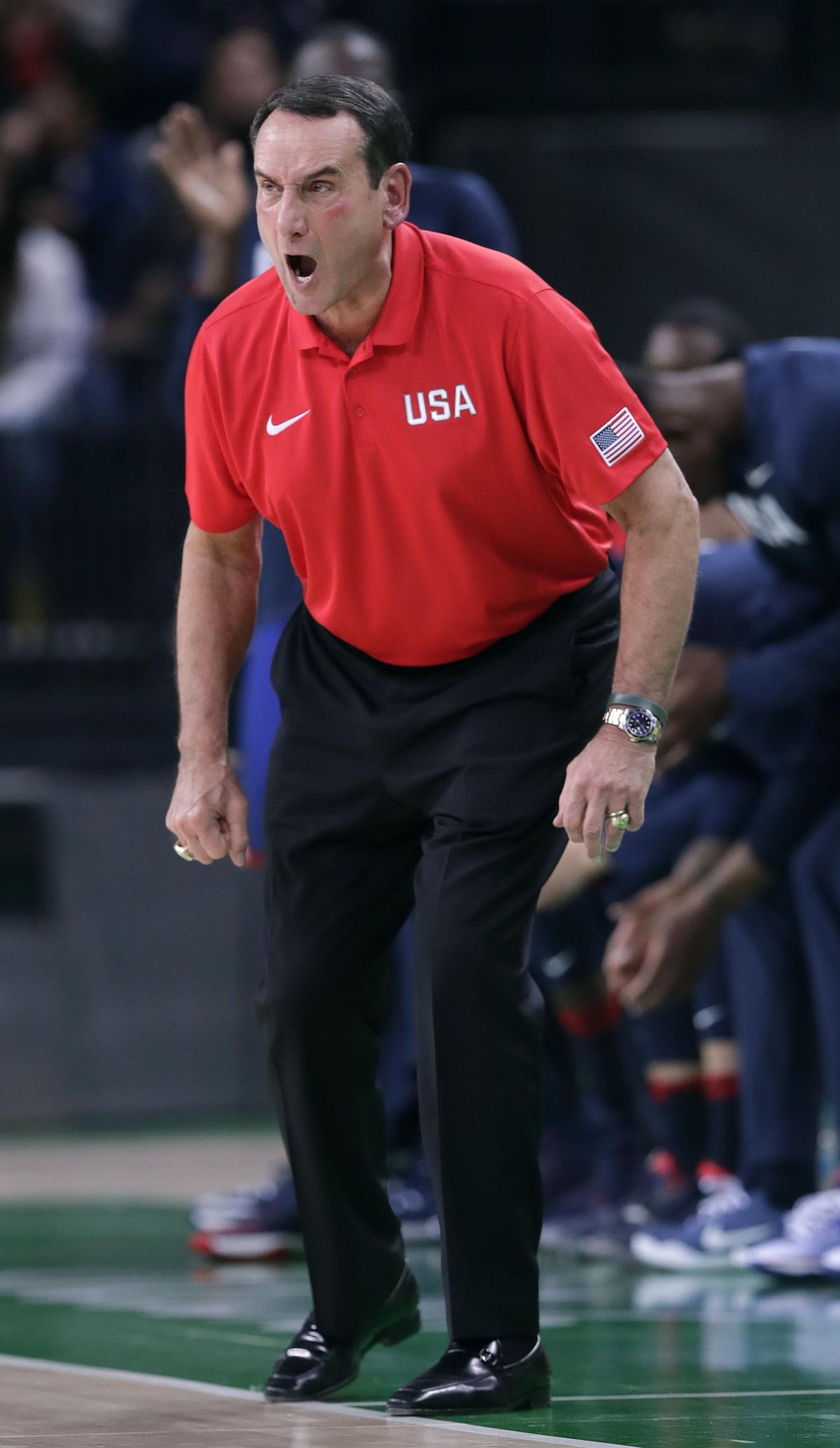 United States head coach Mike Krzyzewski reacts on the bench during a basketball game against Australia. (Charlie Neibergall / Associated Press)