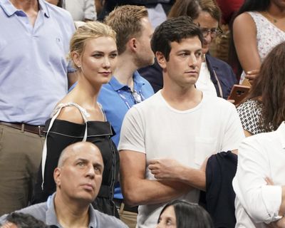 Karlie Kloss, top left, and Joshua Kushner attend the semifinals of the U.S. Open tennis tournament Sept. 6, 2018, at the USTA Billie Jean King National Tennis Center in New York. Supermodel Kloss has married businessman Joshua Kushner who is the younger brother of White House senior adviser Jared Kushner. Kloss posted a photo of her in a wedding dress and Kushner in a tuxedo – both beaming – on Instagram and Twitter on Thursday night, Oct. 18, 2018. (Greg Allen / Invision/Associated Press)