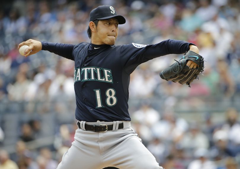 Seattle Mariners starter Hisashi Iwakuma retired 11 of the first 12 Yankees he faced Saturday in New York. (Associated Press)