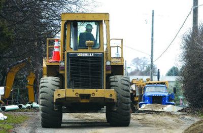 
On Valleyway, heavy equipment blocks the way. Some of the projects set to begin this summer will mean the closure of the I-90 overpass at Sullivan Road  for three weeks and the closure of Pines Road  for six months, as freeway ramps are reconfigured and a light is added at Mansfield Avenue.  
 (J. BART RAYNIAK / The Spokesman-Review)