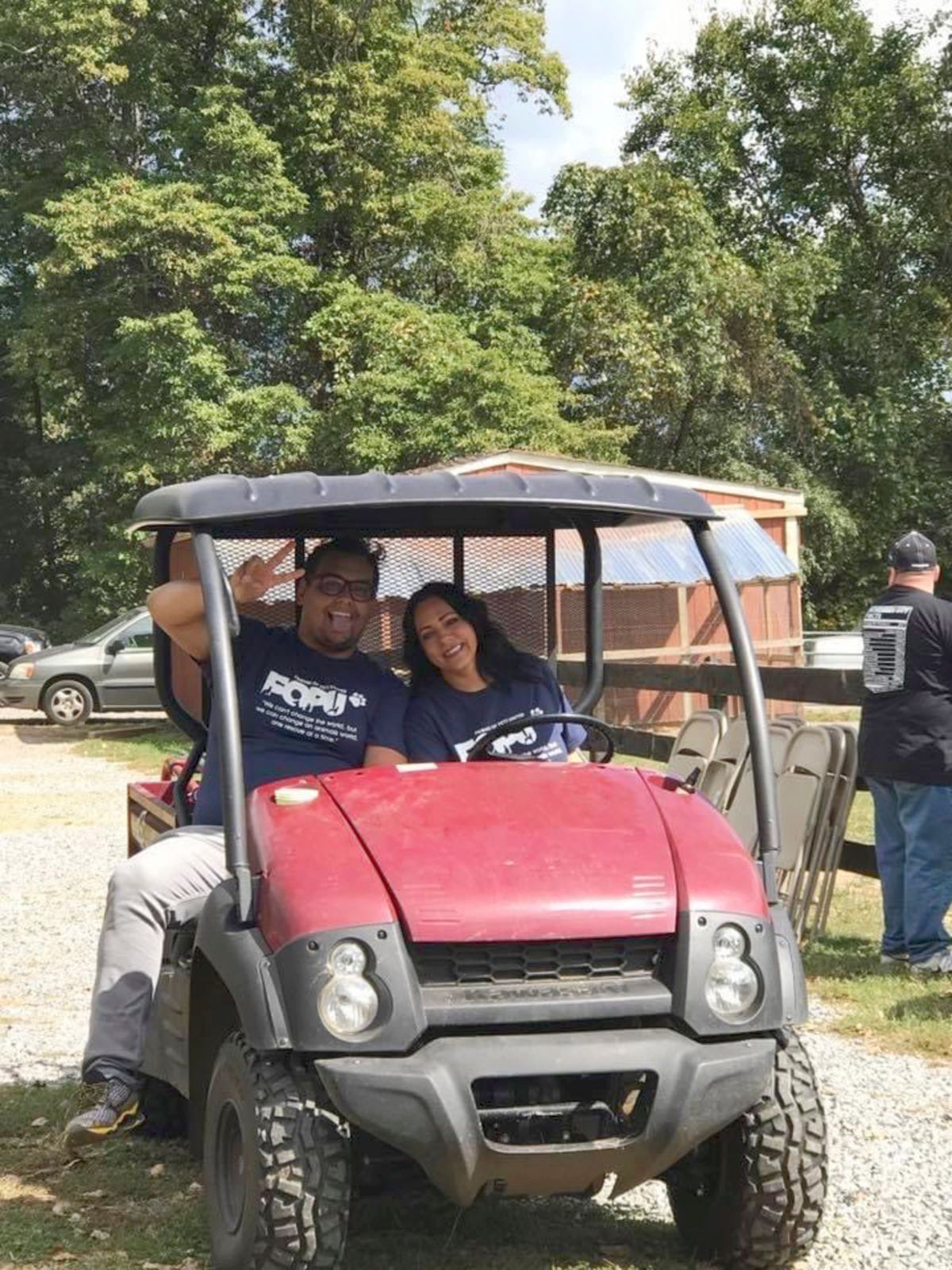 A photo provided by Andrea dos Santos, a veterinary technician, shows her at right with George Santos at a charity event to benefit her farm in New Jersey in 2017. She says Santos kept the proceeds from the event.  (New York Times)