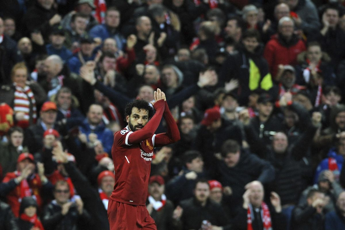 Liverpool’s Mohamed Salah celebrates after scoring his side’s opening goal during the Champions League semifinal, first leg, soccer match between Liverpool and Roma at Anfield Stadium, Liverpool, England, Tuesday, April 24, 2018. (Rui Vieira / Associated Press)