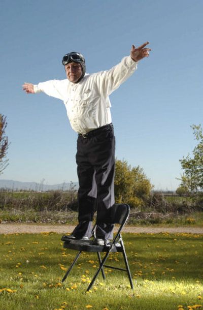 
Johnny Kazian strikes a wing-walking pose in Kuna, Idaho. Kazian was a Hollywood stuntman and a wing walker, and is credited with saving the death-defying practice. 
 (Associated Press / The Spokesman-Review)