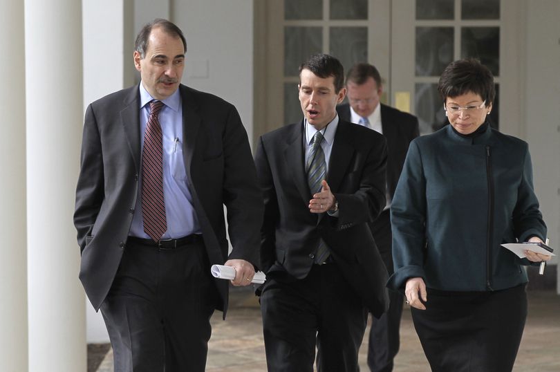 President Obama's advisers, from left, David Axelrod, David Plouffe, White House Press Secretary Robert Gibbs, and Valerie Jarrett, walk along the Colonnade at the White House in Washington, Tuesday, Jan. 25, 2011, after working with Obama on the day of his State of the Union address. (J. Applewhite / Associated Press)