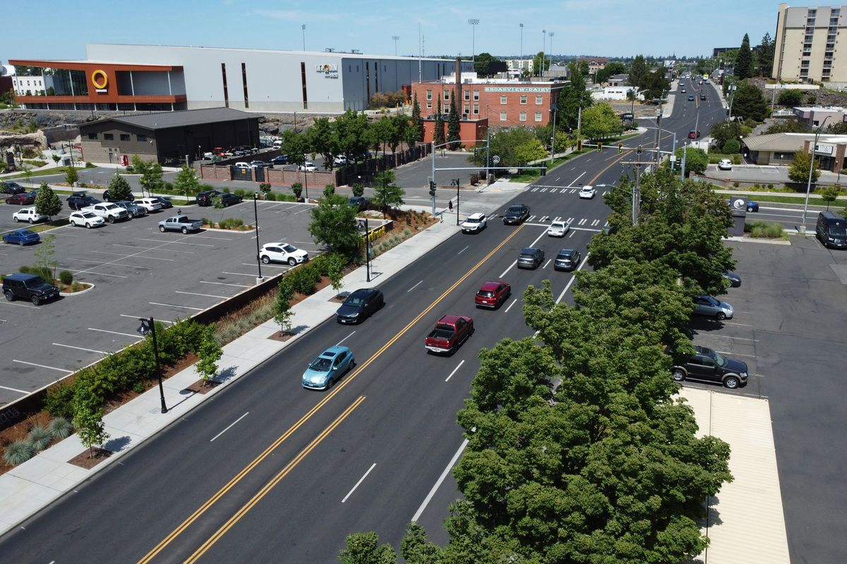 Present day: North Washington Street, a major arterial for commuters through downtown Spokane, now runs past the north side of a completed Riverfront Park and the new Podium sports complex in Spokane. (Jesse Tinsley/THE SPOKESMAN-REVIEW)