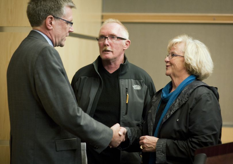 After a press conference in the Thomas S. Foley U.S. Courthouse in Spokane, Wash., Otto Zehm family members Dale Zehm, center, with his wife Sandy, thank U.S. Attorney Mike Ormsby, far left, for helping get a guilty verdict in the Karl Thompson trial, Wednesday, Nov. 2, 2011. (Colin Mulvany / The Spokesman-Review)