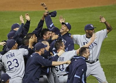Tampa Bay players celebrate after Monday’s ALDS-clinching win. (Associated Press / The Spokesman-Review)