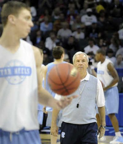 
Tar Heels coach Roy Williams, right, bleeds Carolina blue. The S-R
 (Christopher Anderson The S-R / The Spokesman-Review)