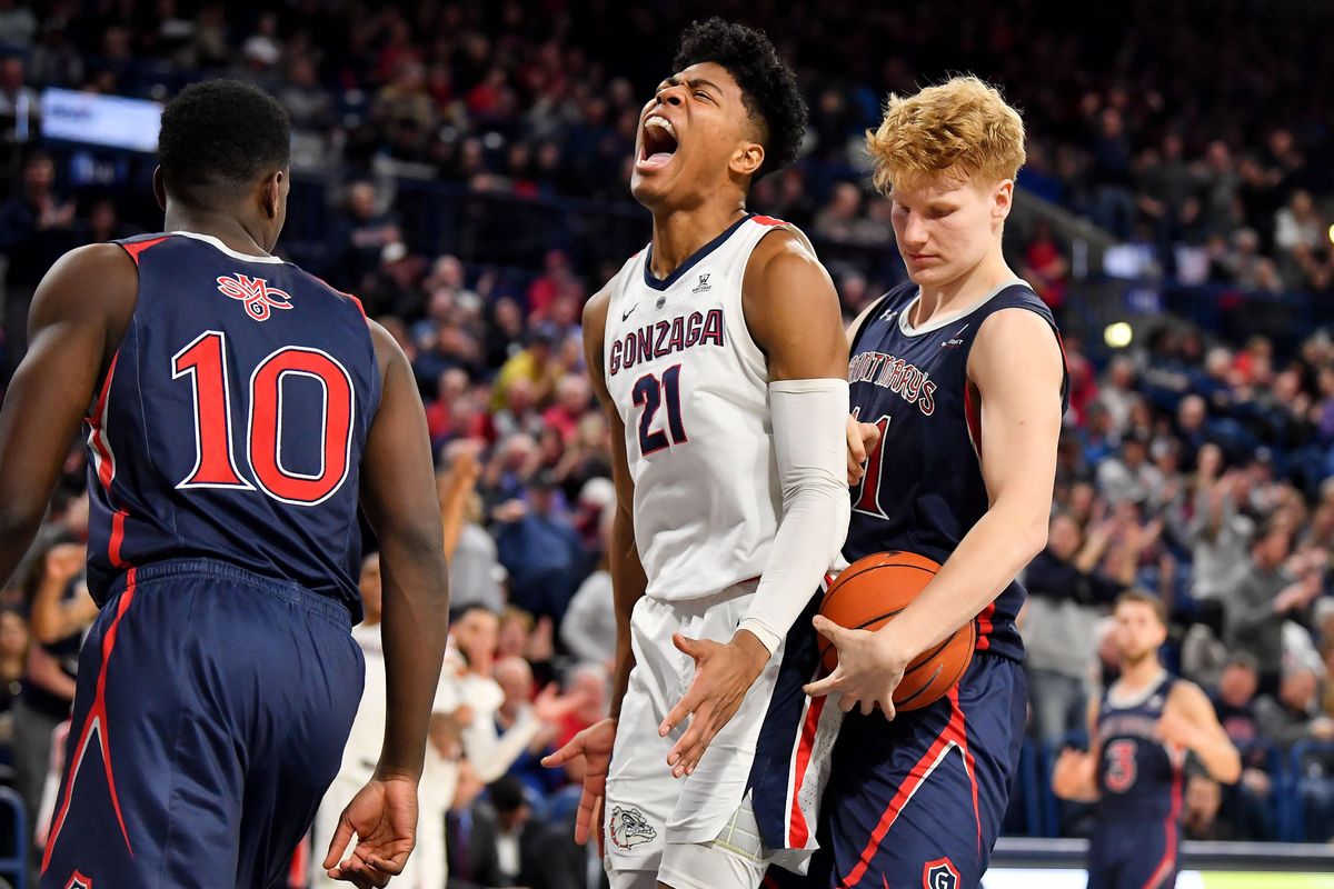 Gonzaga Bulldogs forward Rui Hachimura (21) reacts after he dunked on an alley-oop from guard Geno Crandall (0)  during the second half of a college basketball game on Saturday, February 9, 2019, at McCarthey Athletic Center in Spokane, Wash. Gonzaga won the game 94-46. (Tyler Tjomsland / The Spokesman-Review)