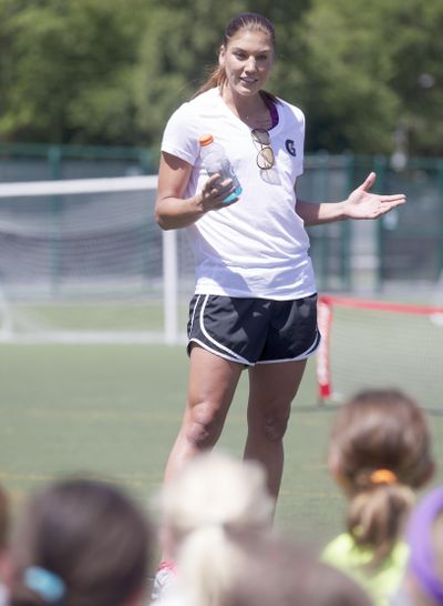 U.S. National Team and Seattle Reign FC goalkeeper Hope Solo talks at the University of Washington Soccer Camp on  July 24, 2013, in Seattle. A health investigation has found that artificial fields are not causing increased rates of cancer in Seattle-area soccer players, an issue which was brought to light in 2009 by University of Washington associate women’s soccer coach Amy Griffin. (Stephen Brashear / Invision for Gatorade)