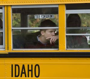 A Coeur d'Alene High student seems pensive during a school bus ride to Gonzaga in September 2014. (Dan Pelle)