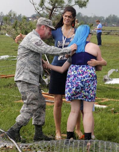 Parents reunite with their children at Briarwood Elementary school after a tornado destroyed the school in south Oklahoma City, Monday, May 20, 2013. Near SW 149th and Hudson. (Paul Hellstern / The Oklahoman)