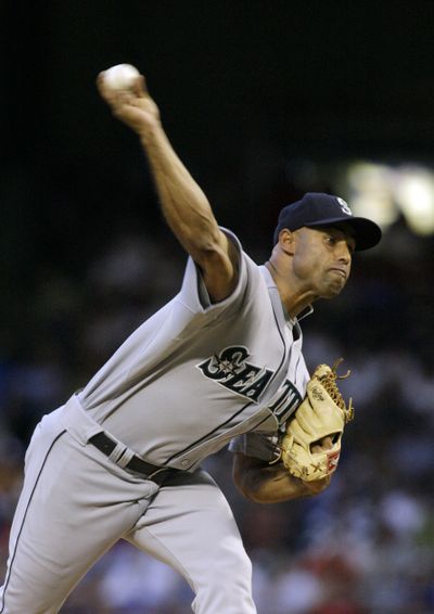 Seattle’s Miguel Batista allowed two earned runs in six innings. (Associated Press / The Spokesman-Review)