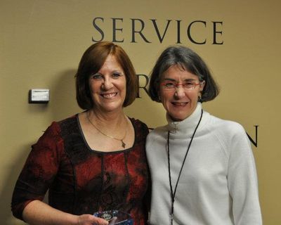 Spokane resident Carey Smith was honored by Police Chief Anne Kirkpatrick for helping track a bank robber in July. (Spokane Police Department)