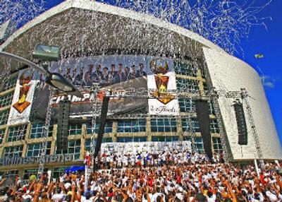 
Streamers are shot from the American Airlines Arena in Miami as the  Heat celebrate their NBA championship Friday.
 (Associated Press / The Spokesman-Review)