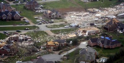 
The zigzag path of tornado destruction is seen in Gallatin, Tenn., on Saturday. Tornadoes were spotted in about 10 Tennessee counties on Friday, the second wave of deadly storms to hit the state in less than a week. One tornado left a swath 10 miles long. 
 (Associated Press / The Spokesman-Review)