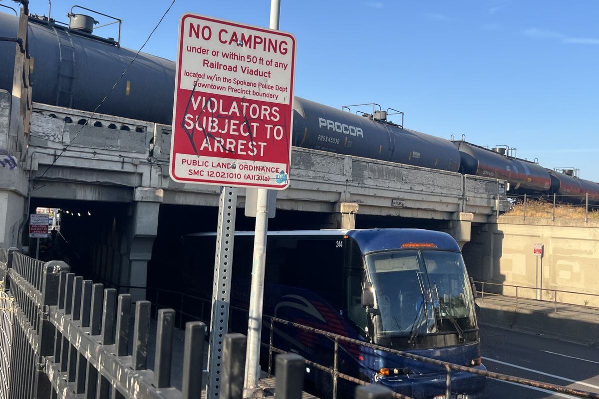 Spokane police say a man suffered critical injuries on Wednesday afternoon when he was set on fire under the railroad .