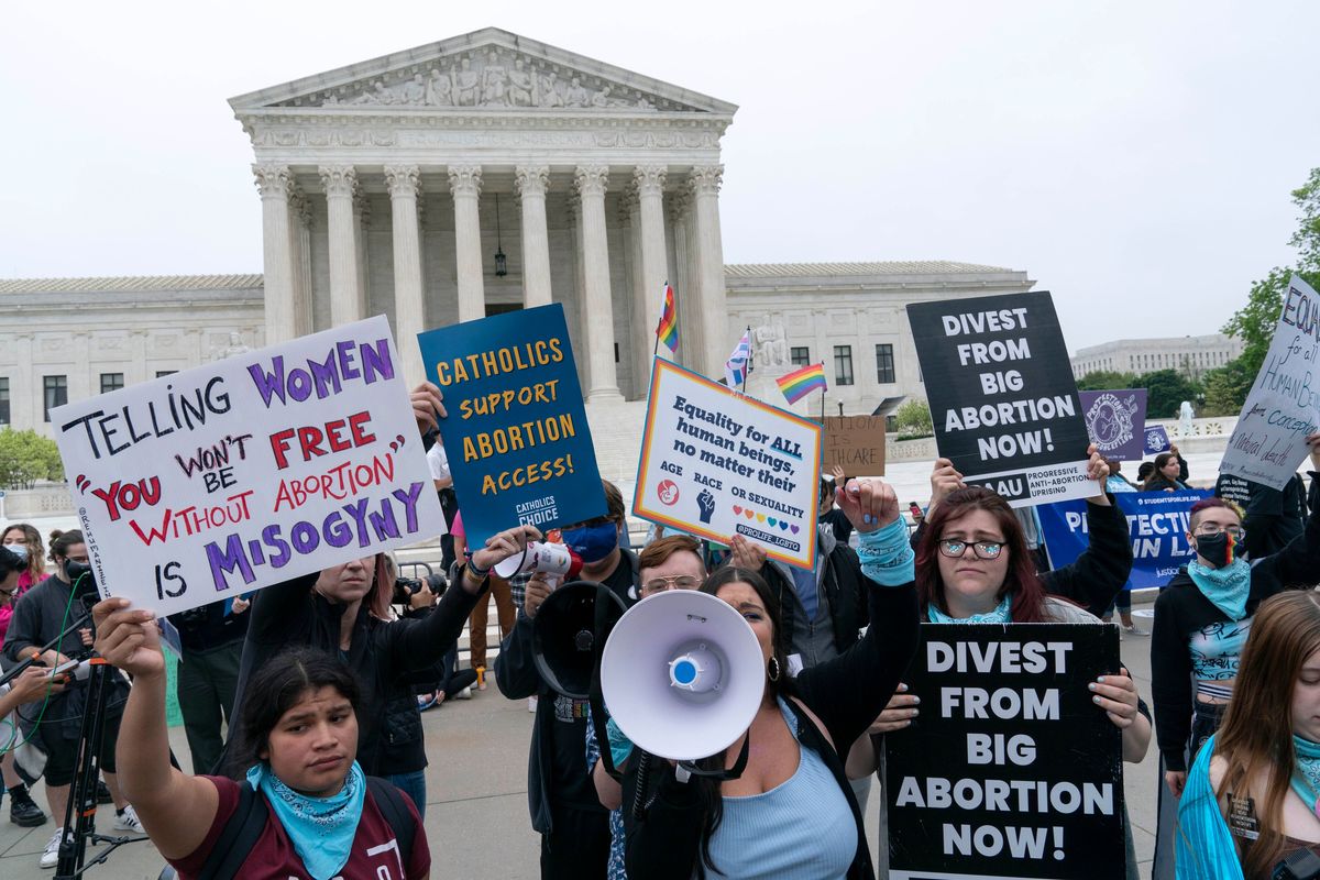 Demonstrators protest outside of the U.S. Supreme Court Tuesday, May 3, 2022 in Washington. A draft opinion suggests the U.S. Supreme Court could be poised to overturn the landmark 1973 Roe v. Wade case that legalized abortion nationwide, according to a Politico report released Monday. Whatever the outcome, the Politico report represents an extremely rare breach of the court
