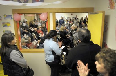 An overflow crowd applauds a call for action concerning the intersection of HIghway 195 and Cheney-Spokane Road  on Feb. 10. Recent accidents there have residents upset.  (CHRISTOPHER ANDERSON / The Spokesman-Review)