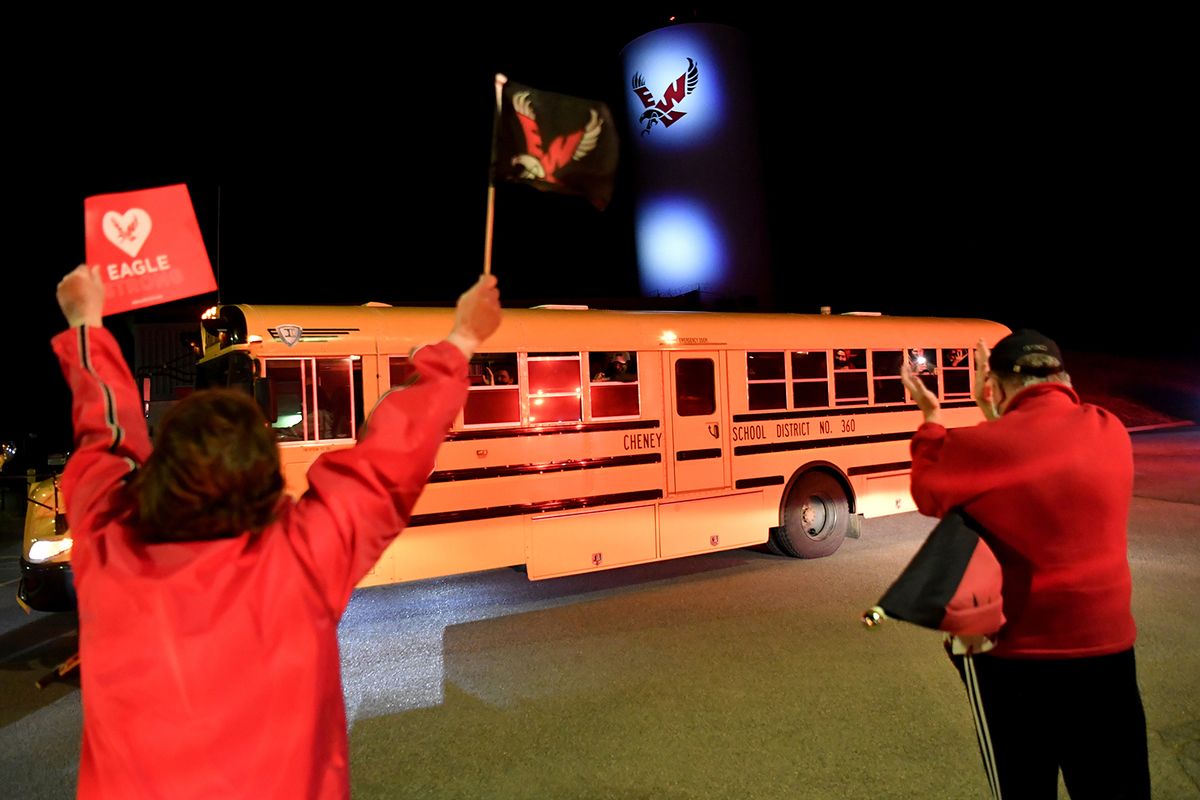 EWU fans Ed Franklin and his wife Susan, left, cheer and applaud as EWU