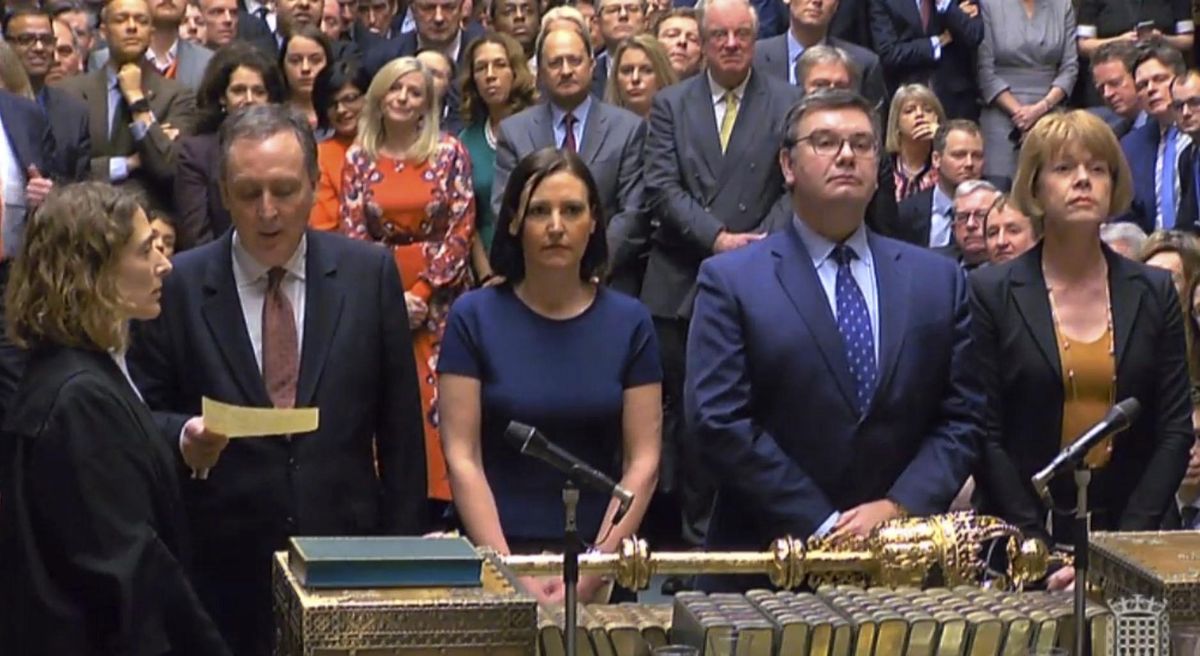 In this grab taken from video, MPs announce the result of a vote on the Prime Minister
