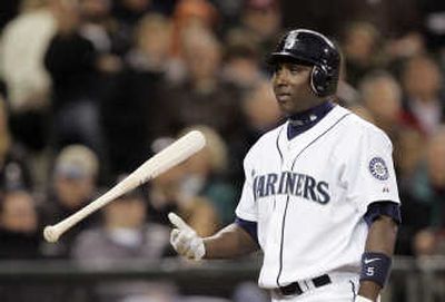 
Seattle's Jose Lopez flips his bat after striking out in sixth inning. Associated Press
 (Associated Press / The Spokesman-Review)