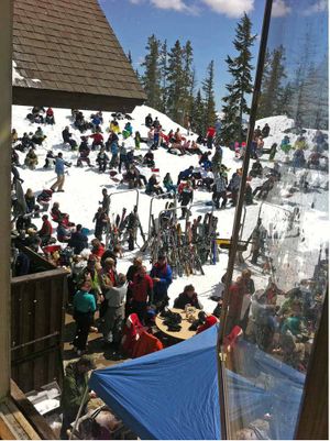 Skiers enjoy the sunshine and the barbecue at Silver Mountain Resort on Saturday, April 23, 2011. (Chuck Hartshorn)